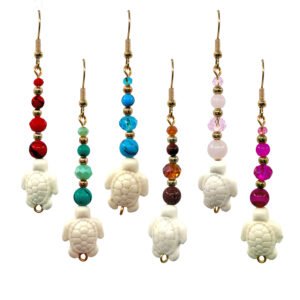 Sea turtle beaded dangle earrings with off-white turtle beads, colorful stone and crystal beads, and gold-tone accents